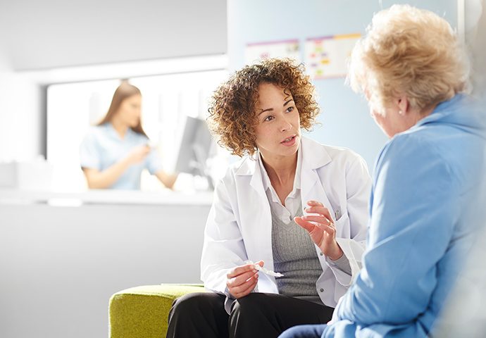 doctor speaking to a patient